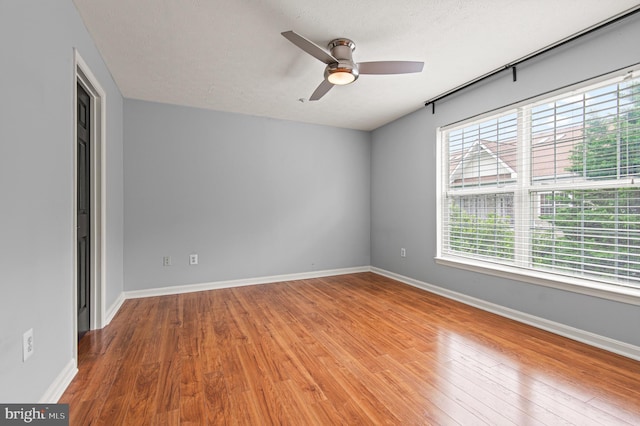 2000 Phillips Ter Unit 12, Annapolis, MD 21401 - spare room featuring wood finished floors, ceiling fan, baseboards, and a textured ceiling