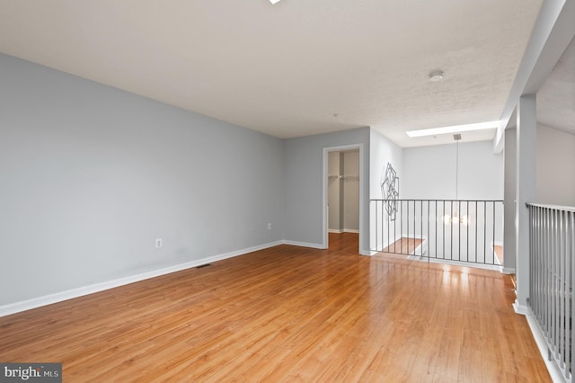 2000 Phillips Ter Unit 12, Annapolis, MD 21401 - unfurnished room featuring light wood-style flooring, baseboards, and a smoke detector