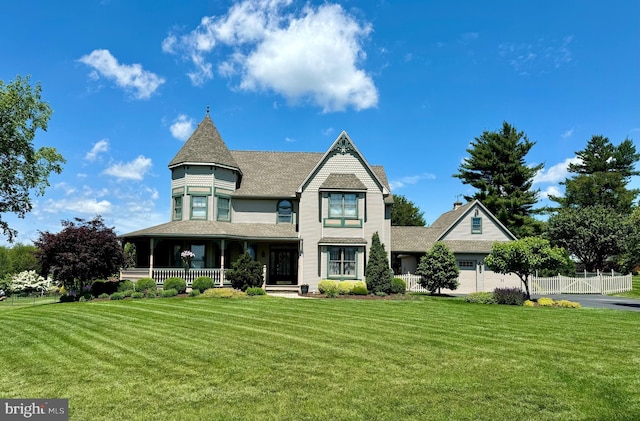 13 N Clearview Dr, Palmyra, PA 17078 - victorian home featuring a porch, an attached garage, and driveway