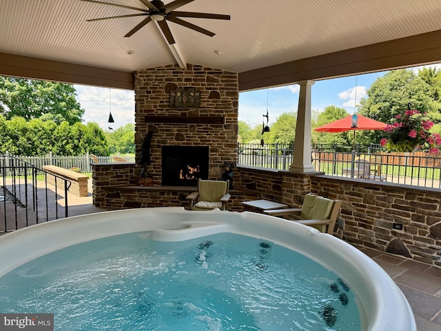 13 N Clearview Dr, Palmyra, PA 17078 - view of pool featuring an outdoor stone fireplace, a ceiling fan, and a patio