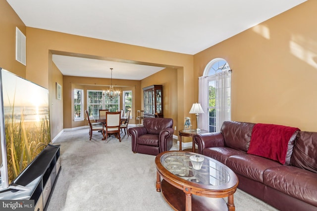 148 Ryans Run, Sicklerville, NJ 08081 - living room with a chandelier and light colored carpet