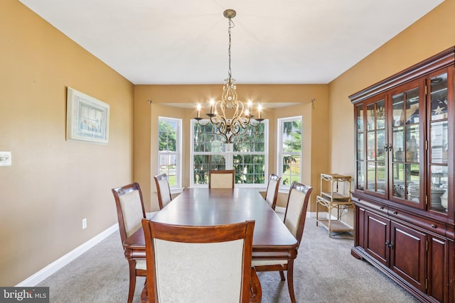148 Ryans Run, Sicklerville, NJ 08081 - carpeted dining space with a chandelier and healthy amount of natural light