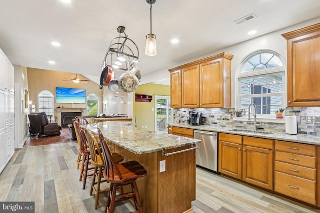 148 Ryans Run, Sicklerville, NJ 08081 - kitchen with dishwasher, a ceiling fan, tasteful backsplash, light stone counters, and open floor plan