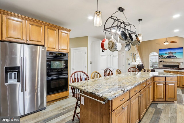 148 Ryans Run, Sicklerville, NJ 08081 - kitchen featuring stainless steel refrigerator with ice dispenser, a breakfast bar area, light wood-type flooring, a ceiling fan, and recessed lighting