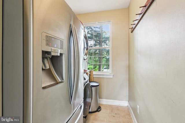 148 Ryans Run, Sicklerville, NJ 08081 - laundry room with stacked washer and clothes dryer and plenty of natural light