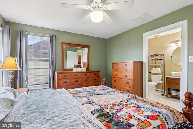 148 Ryans Run, Sicklerville, NJ 08081 - tiled bedroom featuring ensuite bath and a ceiling fan