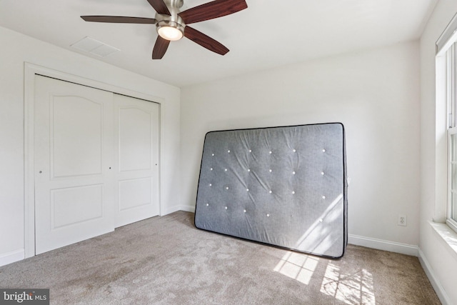 148 Ryans Run, Sicklerville, NJ 08081 - unfurnished bedroom with carpet floors, a ceiling fan, and a closet