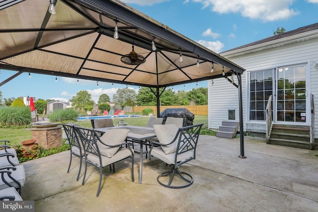 148 Ryans Run, Sicklerville, NJ 08081 - view of patio / terrace with a gazebo, entry steps, a storage unit, outdoor dining area, and a grill