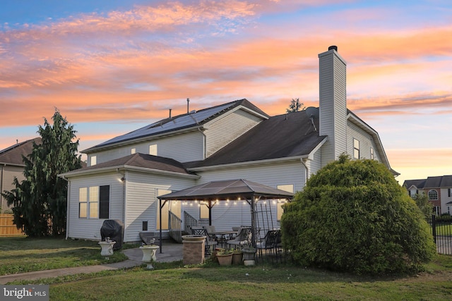148 Ryans Run, Sicklerville, NJ 08081 - rear view of house featuring a gazebo, a chimney, and a patio