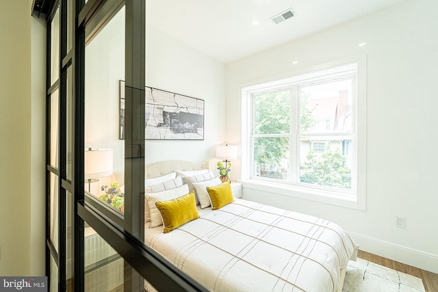 2517 Ontario Rd NW Unit 5, Washington, DC 20009 - bedroom featuring wood finished floors and baseboards