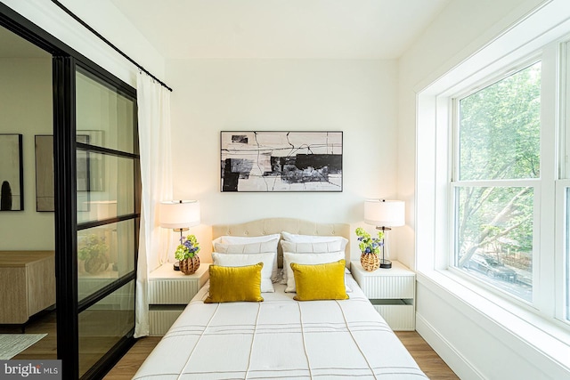 2517 Ontario Rd NW Unit 5, Washington, DC 20009 - bedroom featuring wood finished floors and baseboards