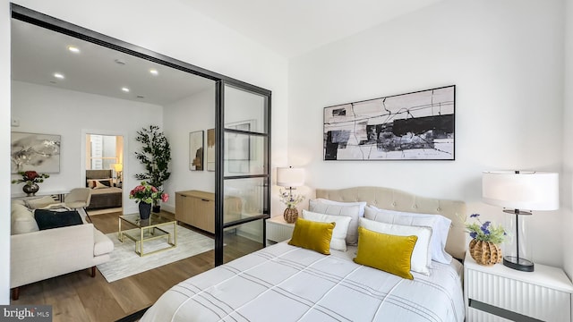 2517 Ontario Rd NW Unit 5, Washington, DC 20009 - bedroom with wood finished floors and recessed lighting