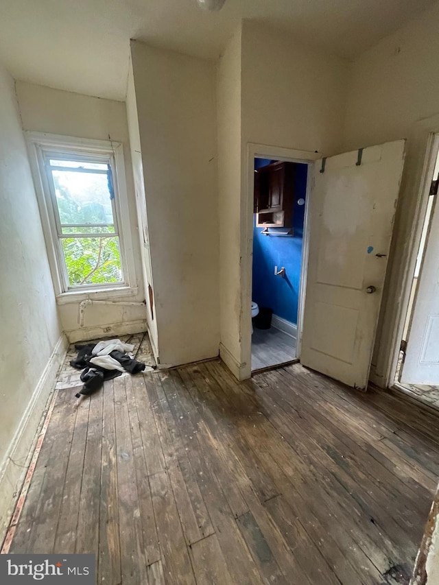 2408 N 15th St, Philadelphia, PA 19132 - foyer entrance featuring hardwood / wood-style floors and baseboards
