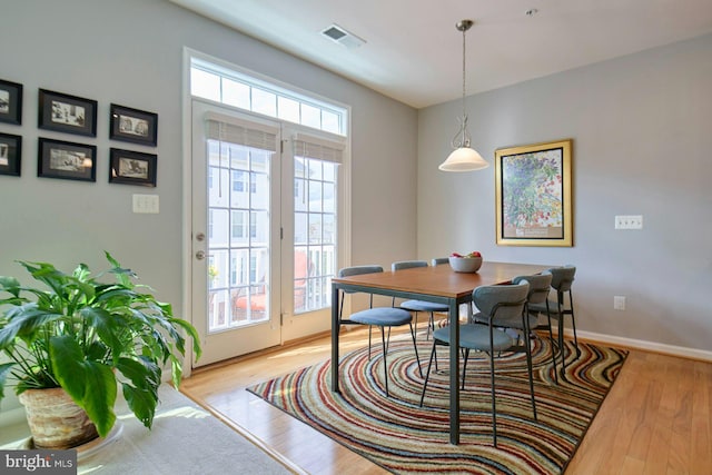 21623 Romans Dr, Ashburn, VA 20147 - dining space with wood finished floors and baseboards