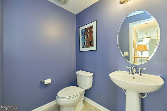 21623 Romans Dr, Ashburn, VA 20147 - bathroom featuring toilet, baseboards, and tile patterned flooring