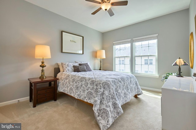 21623 Romans Dr, Ashburn, VA 20147 - bedroom with baseboards, light carpet, and ceiling fan