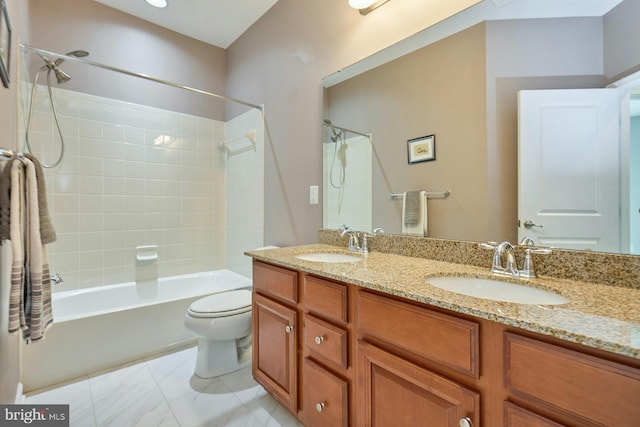 21623 Romans Dr, Ashburn, VA 20147 - bathroom featuring washtub / shower combination, double vanity, and toilet