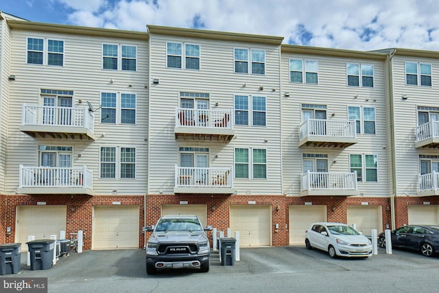 21623 Romans Dr, Ashburn, VA 20147 - view of property featuring a garage and driveway