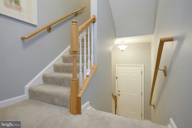 21623 Romans Dr, Ashburn, VA 20147 - stairs featuring carpet floors and baseboards