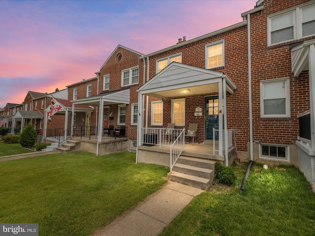 1016 Elm Rd, Halethorpe, MD 21227 - multi unit property with a porch, brick siding, and a yard