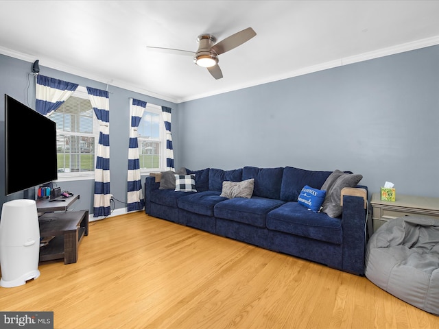1016 Elm Rd, Halethorpe, MD 21227 - living area featuring crown molding, wood finished floors, and ceiling fan