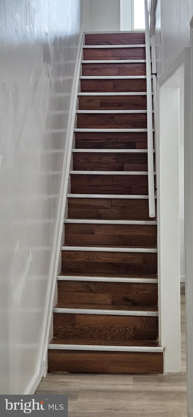 2540 W Silver St, Philadelphia, PA 19132 - stairs featuring wood finished floors