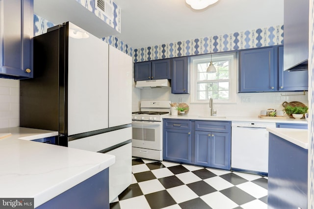 3703 Thornapple St, Chevy Chase, MD 20815 - kitchen featuring white appliances, under cabinet range hood, a sink, blue cabinets, and light flooring