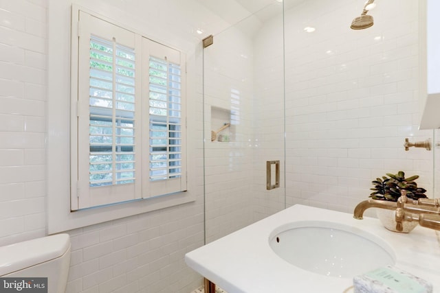3703 Thornapple St, Chevy Chase, MD 20815 - bathroom with tile walls, a shower stall, toilet, and vanity