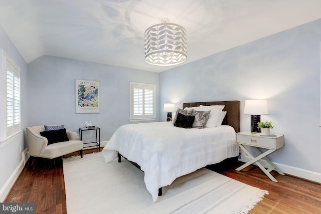 3703 Thornapple St, Chevy Chase, MD 20815 - bedroom featuring wood finished floors, baseboards, and vaulted ceiling