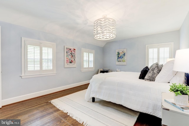 3703 Thornapple St, Chevy Chase, MD 20815 - bedroom with wood finished floors, baseboards, and lofted ceiling