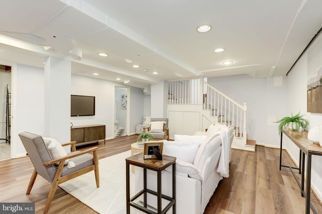 3703 Thornapple St, Chevy Chase, MD 20815 - living room featuring stairway, light wood-style flooring, and recessed lighting