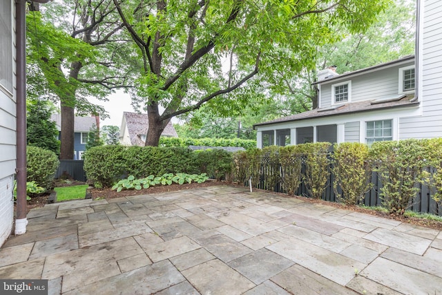 3703 Thornapple St, Chevy Chase, MD 20815 - fenced backyard with a patio