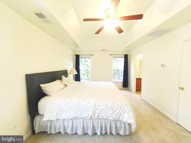 35547 Sarasota St, Round Hill, VA 20141 - bedroom featuring a raised ceiling, baseboards, light carpet, ensuite bathroom, and a ceiling fan
