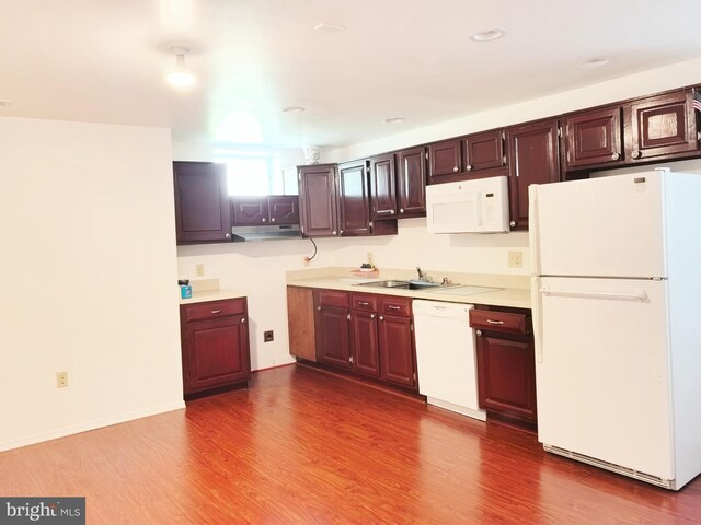 35547 Sarasota St, Round Hill, VA 20141 - kitchen featuring white appliances, under cabinet range hood, dark wood-type flooring, light countertops, and recessed lighting