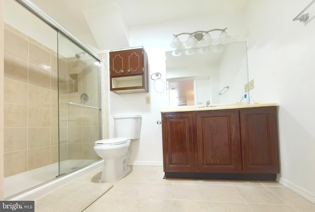 35547 Sarasota St, Round Hill, VA 20141 - bathroom featuring tile patterned flooring, a shower stall, vanity, and baseboards