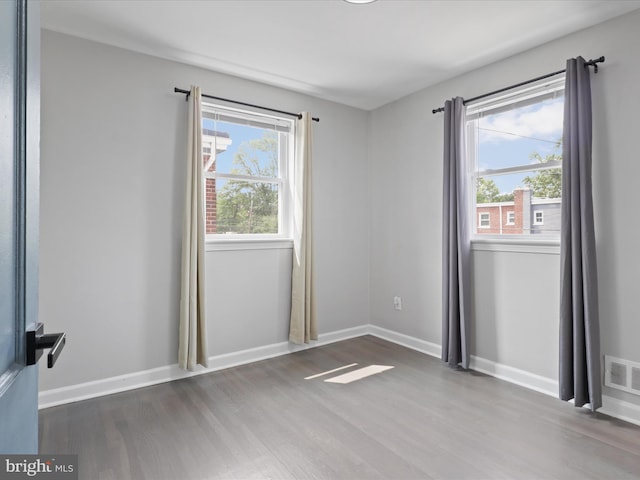 610 Galveston Pl SE, Washington, DC 20032 - empty room featuring wood finished floors and baseboards