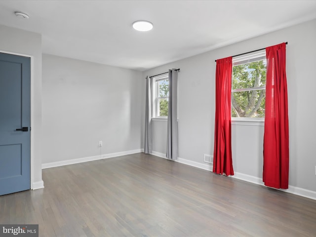610 Galveston Pl SE, Washington, DC 20032 - unfurnished room featuring a smoke detector, wood finished floors, and baseboards