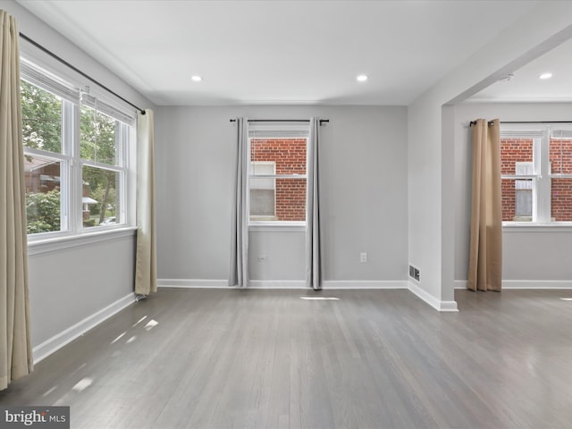 610 Galveston Pl SE, Washington, DC 20032 - empty room with wood finished floors, baseboards, and recessed lighting