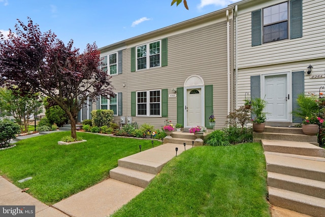 8262 Amity Cir, Gaithersburg, MD 20877 - view of front facade with a front yard
