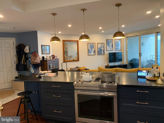 100 Harborview Unit 2307, Baltimore, MD 21230 - kitchen featuring electric stove, hanging light fixtures, a kitchen bar, dark wood-style flooring, and recessed lighting