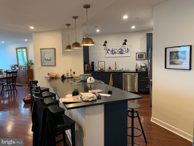 100 Harborview Unit 2307, Baltimore, MD 21230 - indoor wet bar with appliances with stainless steel finishes, dark wood finished floors, decorative light fixtures, and recessed lighting