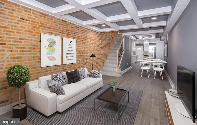 119 S Conkling St, Baltimore, MD 21224 - living area with baseboards, wood finished floors, coffered ceiling, beamed ceiling, and brick wall