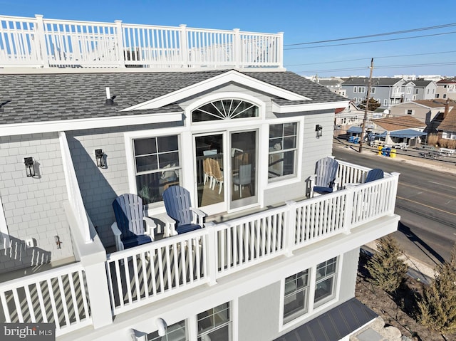 2600 Long Beach Blvd Unit 6, Long Beach Township, NJ 08008 - back of property featuring a balcony and roof with shingles