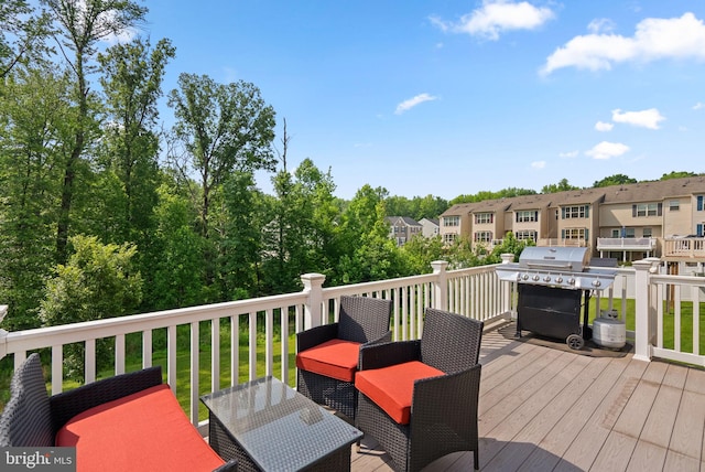 9950 Ravenhurst Rd, Middle River, MD 21220 - wooden terrace featuring area for grilling, a residential view, and outdoor dining area