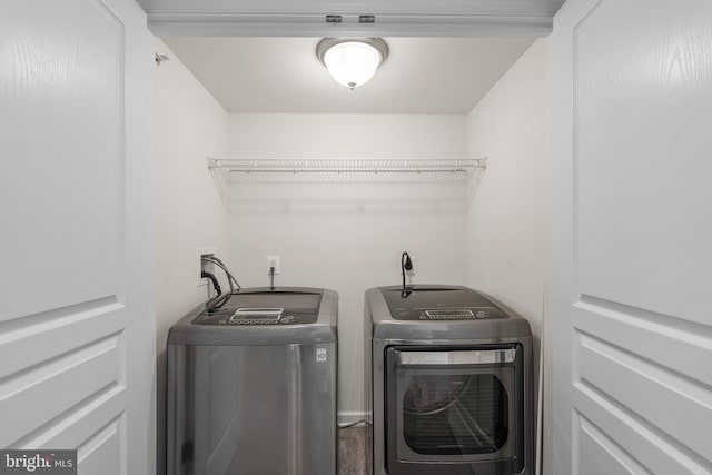 9950 Ravenhurst Rd, Middle River, MD 21220 - laundry area featuring separate washer and dryer