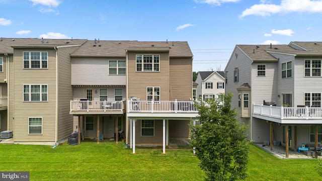 9950 Ravenhurst Rd, Middle River, MD 21220 - back of house with a lawn, a deck, and a residential view