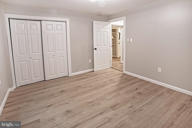 118 Bock Ave, Wenonah, NJ 08090 - unfurnished bedroom featuring baseboards, a closet, and light wood-type flooring