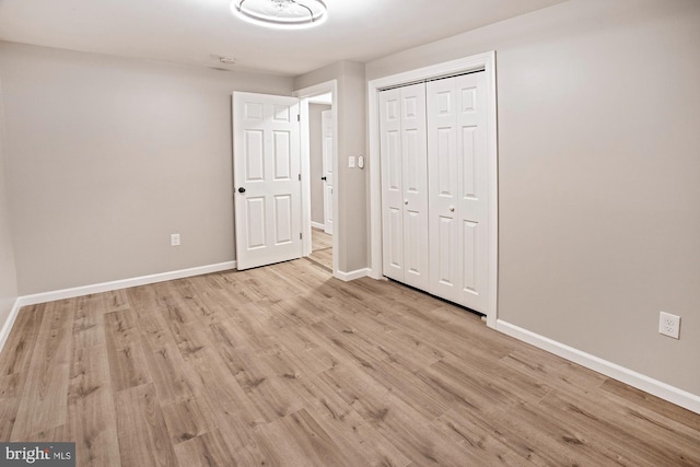 118 Bock Ave, Wenonah, NJ 08090 - unfurnished bedroom featuring light wood finished floors, baseboards, and a closet