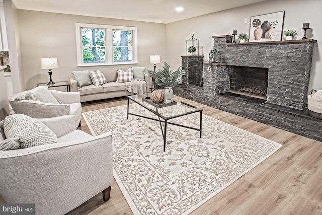 118 Bock Ave, Wenonah, NJ 08090 - living room with wood finished floors, a stone fireplace, and recessed lighting