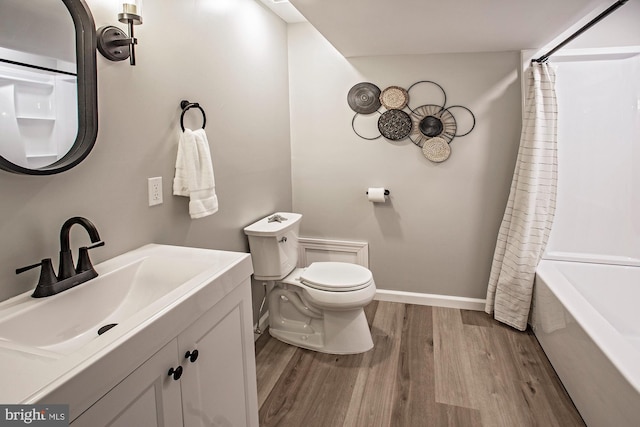 118 Bock Ave, Wenonah, NJ 08090 - bathroom featuring wood finished floors, toilet, vanity, baseboards, and shower / bath combo with shower curtain